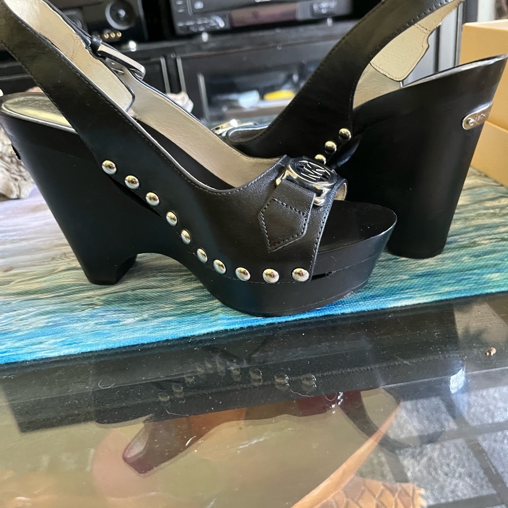 Black Michael Kore wedges. Size 7 worn a couple of times.